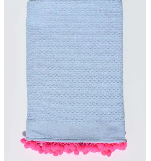Fouta en nid d'abeille unie bleu clair avec pompons rose fluo Fouta Tunisia - 1