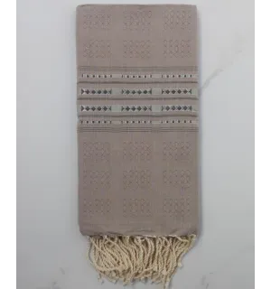 Fouta thalasso taupe avec des motifs
