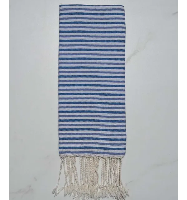 Enfant ziwane bleu, charette et blanc 