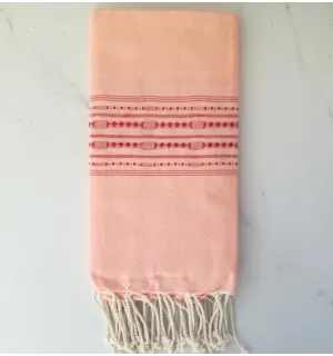 Fouta thalasso rose avec motifs rouge