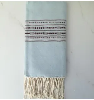 Fouta thalasso bleu avec motifs marron