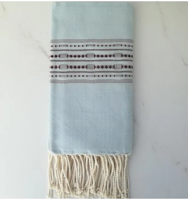 Fouta thalasso bleu avec motifs marron 
