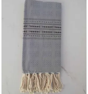 Fouta thalasso bleu avec motifs aubergine