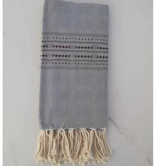 Fouta thalasso bleu avec motifs aubergine 