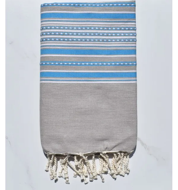 Fouta arabesque taupe clair avec rayures bleu 