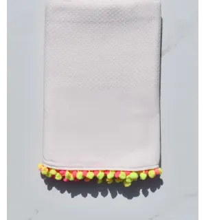 Fouta rose clair avec pompons 