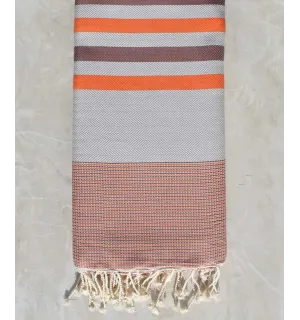 Jeté chevron gris perle, orange et et cannelle