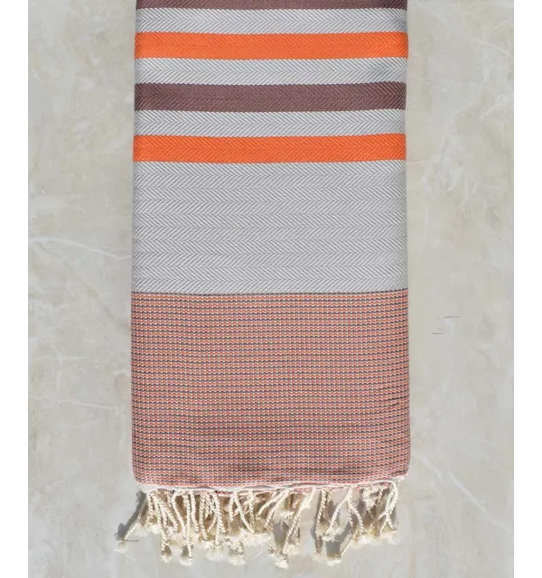 Jeté chevron gris perle, orange et et cannelle 