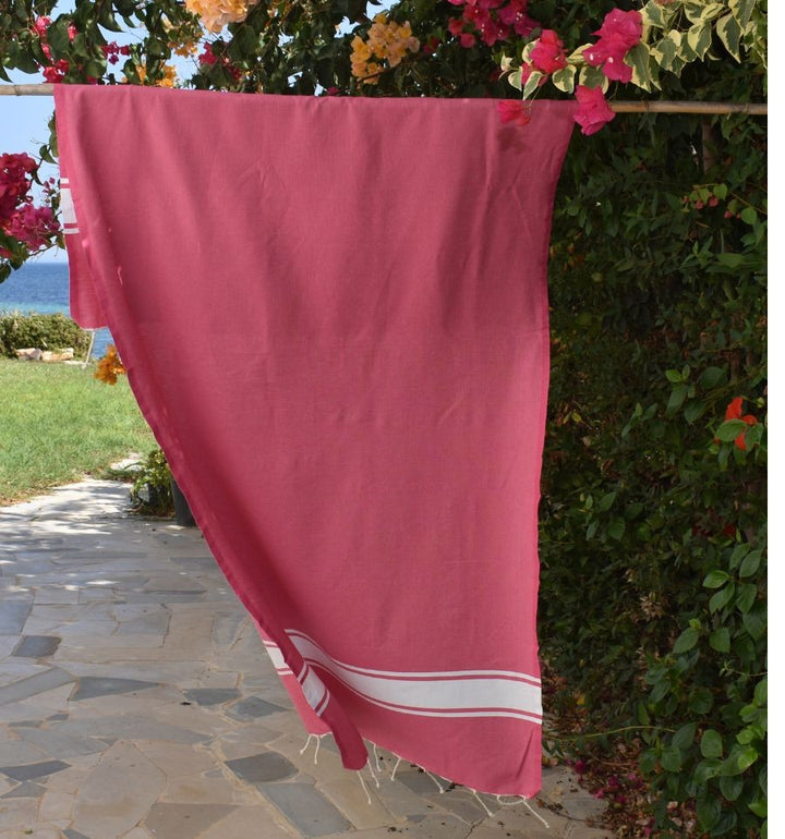 Telo mare in cotone riciclato rosa fucsia