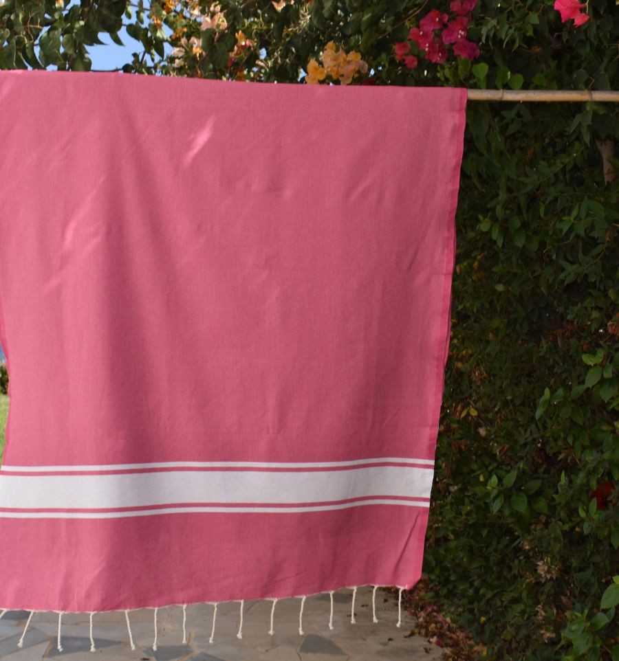 Telo mare in cotone riciclato rosa fucsia