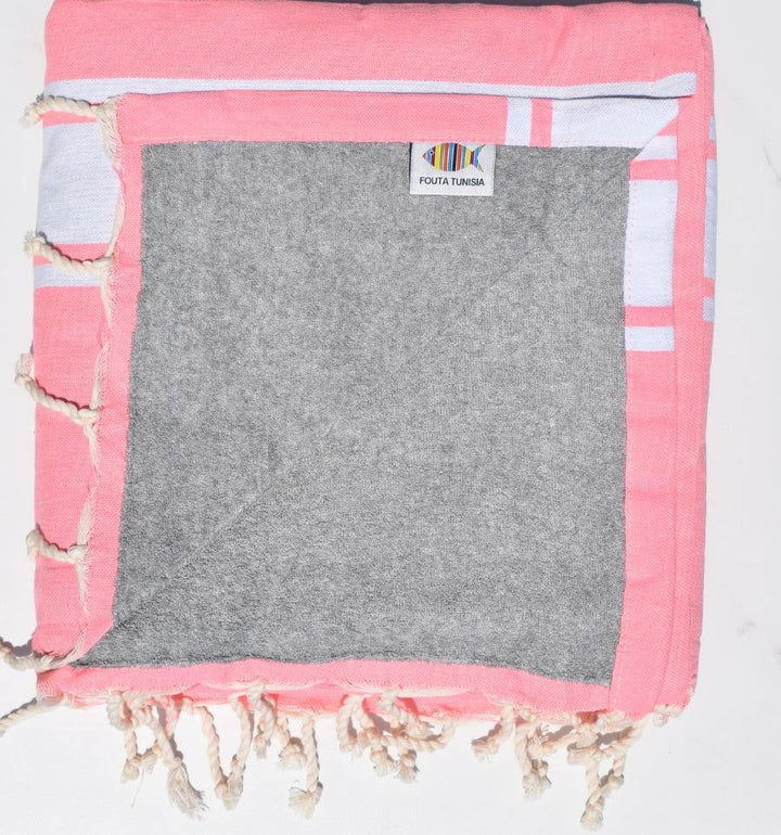 Fouta rose fluo doublée éponge grise