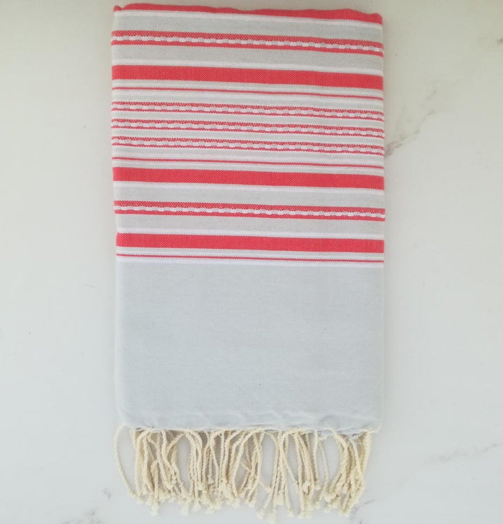Fouta arabesque bleu fumée rayée rose 