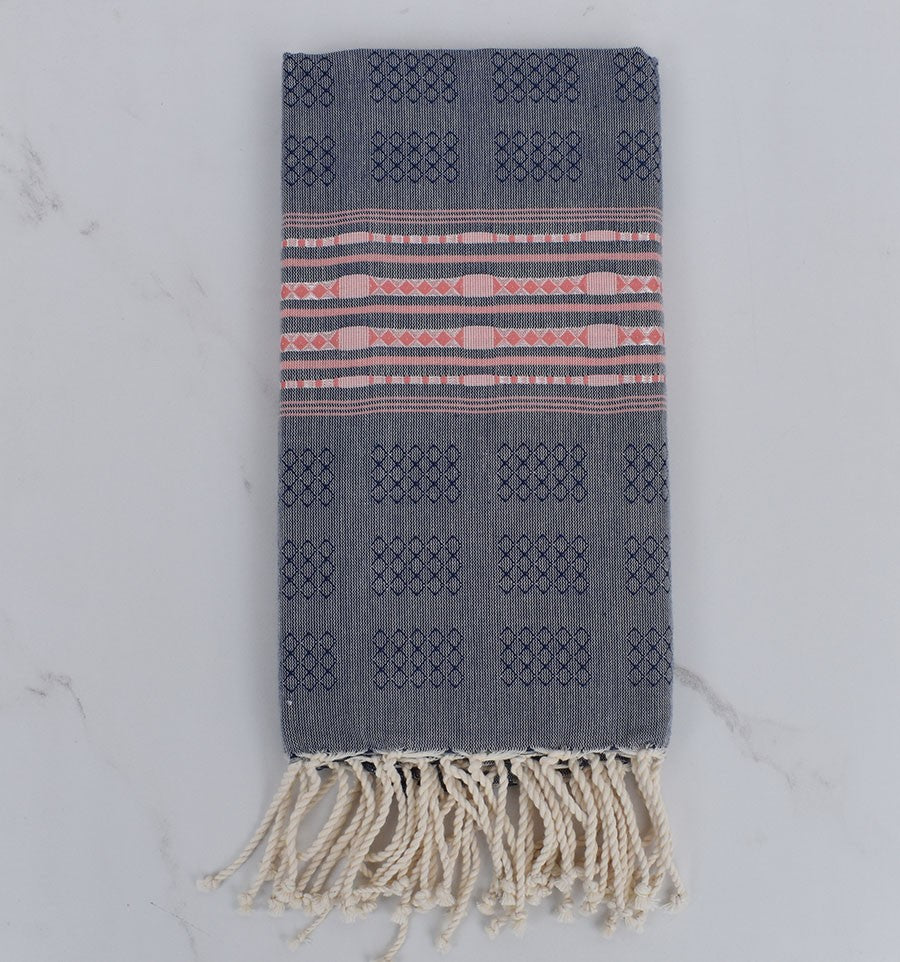 Fouta thalasso bleu avec motifs rose 
