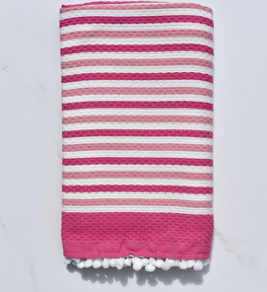 Fouta blanc cassé et rose avec pompons 