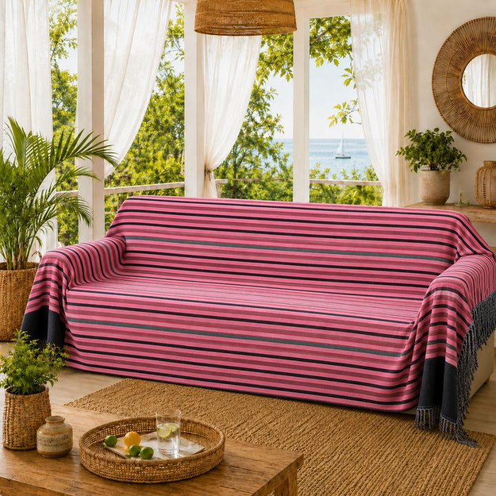 Jeté de canapé rose à rayures noires